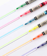 Colorful Dual-Tip Notetaking Pen Set Of 6 with brush and fine tips creating vibrant pastel lines on white paper