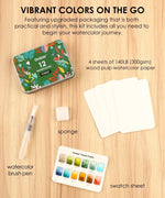 Watercolor Pocket Set Of 12 With Brush - Forest Colors featuring brush pen, sponge, swatch sheet, and paper sheets on wood background