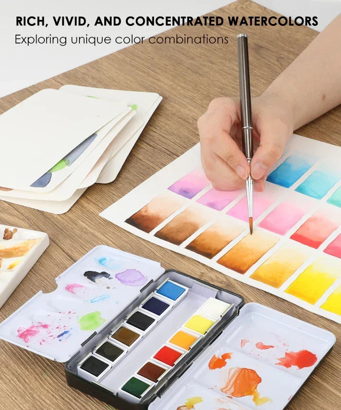 Grabie x @SSavaArt Watercolor 12 Half Pan Deluxe Travel Set with vibrant colors and a hand painting color swatches.