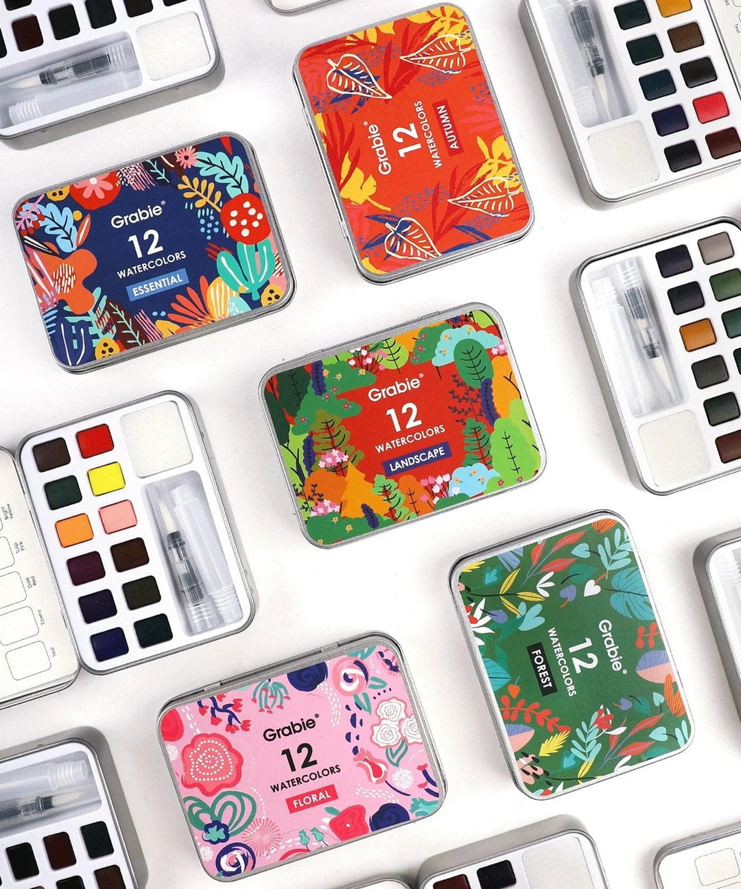 Watercolor Pocket Set Of 12 With Brush - 5 Themes Value Bundle showing colorful watercolor sets with floral and nature designs and brushes.