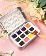Watercolor Pocket Set of 12 - Floral Colors in a metal tin with vibrant floral shades and a fine paintbrush included
