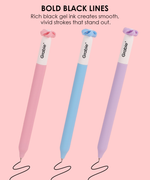 Three colorful Mindful Bloom novelty pens drawing smooth bold black lines on a light pink background.
