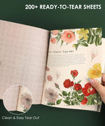 200+ Pages The Botanical Muse Collage Activity Book open to floral art pages with clean, easy tear-out sheets